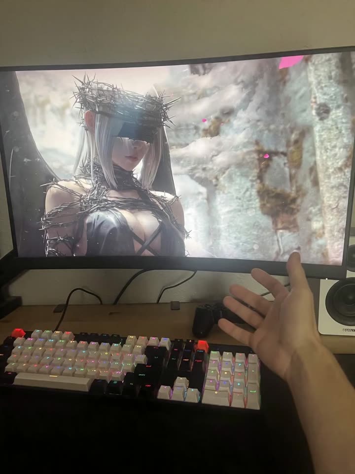 Using the provided image as the starting frame, create a single continuous cinematic shot with no cuts. Preserve the original composition, camera angle, and the viewer's hand in the foreground. The girl is gripping the viewer's hand and immediately pulls herself forward toward the camera, not backward. Her movement is directed out of the screen into the real world. The monitor surface explodes outward with aggressive glass shatter, with fragments flying toward the camera. The girl forcefully drives her body forward through the screen, pushing past the monitor frame.
Her head, shoulders, and torso emerge clearly outside the screen into the viewer's space, as if she is physically entering the real environment. She maintains strong hand contact, pulling herself closer into the foreground. Her movement is fast, aggressive, and physically grounded, with visible tension in her arm and shoulders. The camera slightly pushes back to accommodate her forward motion, maintaining realism.
The environment remains consistent: gaming desk, monitor, lighting. Use cinematic lighting, strong depth of field, motion blur on forward movement, realistic physics, and seamless blending between digital and real world.
movement direction toward camera, subject exits screen into foreground, body crossing screen boundary, strong forward force, no backward motion, no retreat, physically entering real space